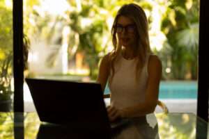 shirley working on her computer helping veterans